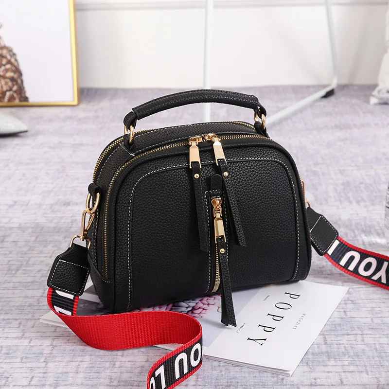 Kleine Handtasche aus PU-Leder mit breitem Riemen