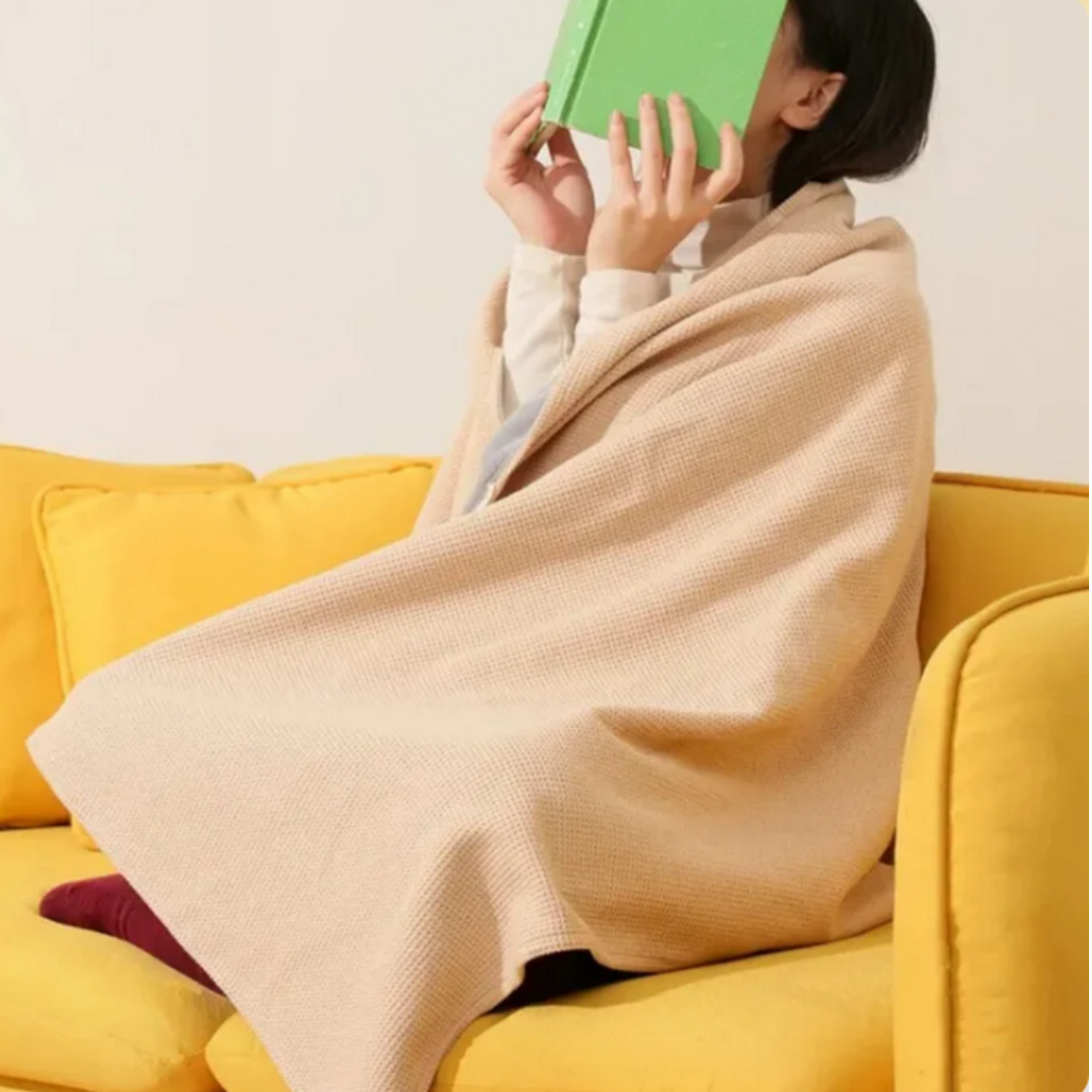 Waschbarer, USB-beheizter Umhang WarmWave